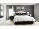 Spacious bedroom with black and white decor at 1946 Quail Fields Cir, Winter Haven, FL 33884