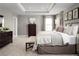 Spacious main bedroom with large bed, dresser, and plenty of natural light at 5775 Anders Way, Saint Cloud, FL 34771