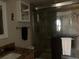 Updated bathroom features a glass enclosed shower and granite vanity at 2390 Ocean Shore Blvd # 1040, Ormond Beach, FL 32176