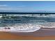 Ocean view of waves crashing along sandy shoreline at 2390 Ocean Shore Blvd # 1040, Ormond Beach, FL 32176