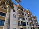 Exterior view shows multiple floors of condos with balconies and ocean views at 2390 Ocean Shore Blvd # 1040, Ormond Beach, FL 32176