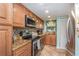 Updated kitchen featuring stainless steel appliances, granite countertops, and ample cabinet space at 2390 Ocean Shore Blvd # 1040, Ormond Beach, FL 32176