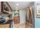 Updated kitchen featuring stainless steel appliances, granite countertops, and ample cabinet space at 2390 Ocean Shore Blvd # 1040, Ormond Beach, FL 32176