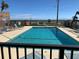 Community pool area with clear blue water with plenty of seating and ocean view at 2390 Ocean Shore Blvd # 1040, Ormond Beach, FL 32176