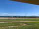 Beautiful ocean views from the lawn with green grass and nice landscaping at 2390 Ocean Shore Blvd # 1040, Ormond Beach, FL 32176