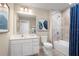 Clean bathroom with a shower/tub combo and updated vanity at 3025 Ruby Falls Dr, Deland, FL 32724