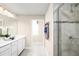 Spa-like bathroom with double vanity, large shower, and view of bedroom at 3025 Ruby Falls Dr, Deland, FL 32724