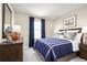 Baseball-themed bedroom with a comfortable bed and ample closet space at 3025 Ruby Falls Dr, Deland, FL 32724