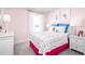 Charming bedroom with colorful bedding and plenty of natural light at 3025 Ruby Falls Dr, Deland, FL 32724