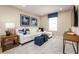 Cozy Gathering room featuring a comfortable sofa and plenty of natural light at 3025 Ruby Falls Dr, Deland, FL 32724