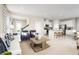 Open floor plan connecting living room and kitchen with modern finishes at 3025 Ruby Falls Dr, Deland, FL 32724