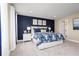 Spacious Primary bedroom with king-size bed and ensuite bathroom at 3025 Ruby Falls Dr, Deland, FL 32724
