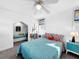Well-lit bedroom with a queen bed and a cozy built-in nook at 104 Sunset Way, Fruitland Park, FL 34731