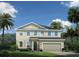 Two-story home with gray siding, gray roof, and a two-car garage at 1202 Whispering Ln, Minneola, FL 34715