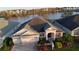 Single-Gathering home with three-car garage, lake view at 5631 Superior Dr, Lakeland, FL 33805