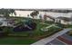 Community playground and lake access with picnic tables at 5631 Superior Dr, Lakeland, FL 33805