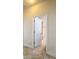 Open doorway leads to a well-lit bathroom with a neutral color scheme at 2588 Egret Loop, Kissimmee, FL 34743