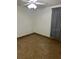 Bright bedroom featuring tiled floors and ceiling fan at 2723 Ashley Ct, Kissimmee, FL 34743