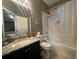 Simple bathroom with tub, shower, and vanity at 629 Copeland Dr, Haines City, FL 33844