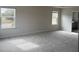 Large main bedroom with carpet flooring and multiple windows at 260 Crossings Ave, St Cloud, FL 34771