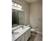 Clean bathroom with double vanity, and a bathtub at 380 Crossings Ave, St Cloud, FL 34771