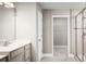 Bathroom with single vanity, walk-in closet, and shower at 5781 Anders Way, Saint Cloud, FL 34771