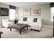Bright loft featuring a sectional sofa and contemporary decor at 5781 Anders Way, Saint Cloud, FL 34771