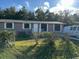 Front view of the house, landscaping at 5840 Nw 16Th St, Ocala, FL 34482