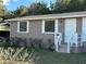 House front view with steps and landscaping at 5840 Nw 16Th St, Ocala, FL 34482