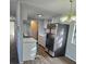 Kitchen features stainless steel appliances and white cabinets at 5840 Nw 16Th St, Ocala, FL 34482