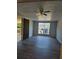 Bright living room with vinyl flooring and large window at 5840 Nw 16Th St, Ocala, FL 34482