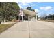 Single story home with carport and landscaped yard at 621 Sw 79Th Ct, Ocala, FL 34474