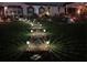 Lit walkway leading to the home at night at 621 Sw 79Th Ct, Ocala, FL 34474