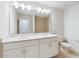 Double vanity bathroom with modern lighting and mirror at 6915 Five Oaks Dr, St Cloud, FL 34773
