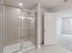 Clean bathroom with a large shower and tile flooring at 6915 Five Oaks Dr, St Cloud, FL 34773