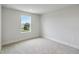 Well-lit bedroom featuring a window with a view at 6915 Five Oaks Dr, St Cloud, FL 34773