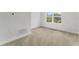 Bright bedroom with neutral walls and carpet at 6915 Five Oaks Dr, St Cloud, FL 34773