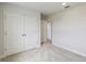 Bedroom with double doors leading to closet and additional room at 6915 Five Oaks Dr, St Cloud, FL 34773