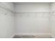 Walk-in closet with wire shelving for ample storage at 6915 Five Oaks Dr, St Cloud, FL 34773