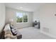 Versatile loft area with a comfortable sofa and a workspace at 6915 Five Oaks Dr, St Cloud, FL 34773