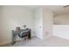 Functional loft workspace with desk and chair, offering additional living space at 6915 Five Oaks Dr, St Cloud, FL 34773