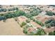 Aerial view showcasing a house, pool, and expansive property at 13660 Se 80Th Ave, Summerfield, FL 34491