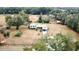 Aerial view of a single-Gathering home on a large lot with a spacious yard at 13660 Se 80Th Ave, Summerfield, FL 34491