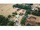 Aerial view showing a home on a large lot with surrounding land at 13660 Se 80Th Ave, Summerfield, FL 34491