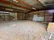 Open-air barn interior with dirt floor and wooden beams at 13660 Se 80Th Ave, Summerfield, FL 34491