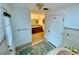 Bathroom with a bathtub, tiled floors and wooden vanity at 13660 Se 80Th Ave, Summerfield, FL 34491