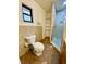 Bathroom with shower and built-in shelves at 13660 Se 80Th Ave, Summerfield, FL 34491
