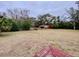 Open farmland with a red barn and wooden fence at 13660 Se 80Th Ave, Summerfield, FL 34491