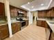 Renovated kitchen with granite countertops and stainless steel appliances at 13660 Se 80Th Ave, Summerfield, FL 34491