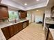 Updated kitchen with granite countertops and stainless steel appliances at 13660 Se 80Th Ave, Summerfield, FL 34491